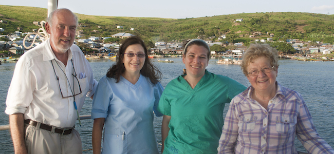 Smiling medical team aboard a Vine Trust ship